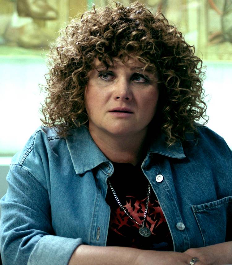 danielle macdonald s josie looking worriedly at something in saccharine vertical