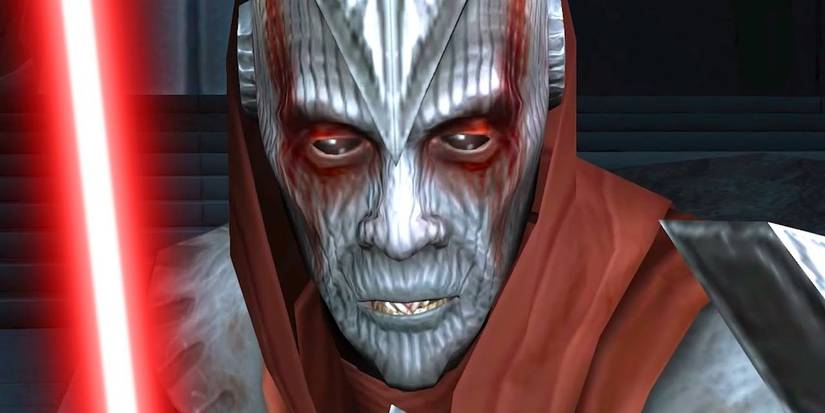 Darth Desolus holding a lightsaber in Star Wars The Force Unleashed.