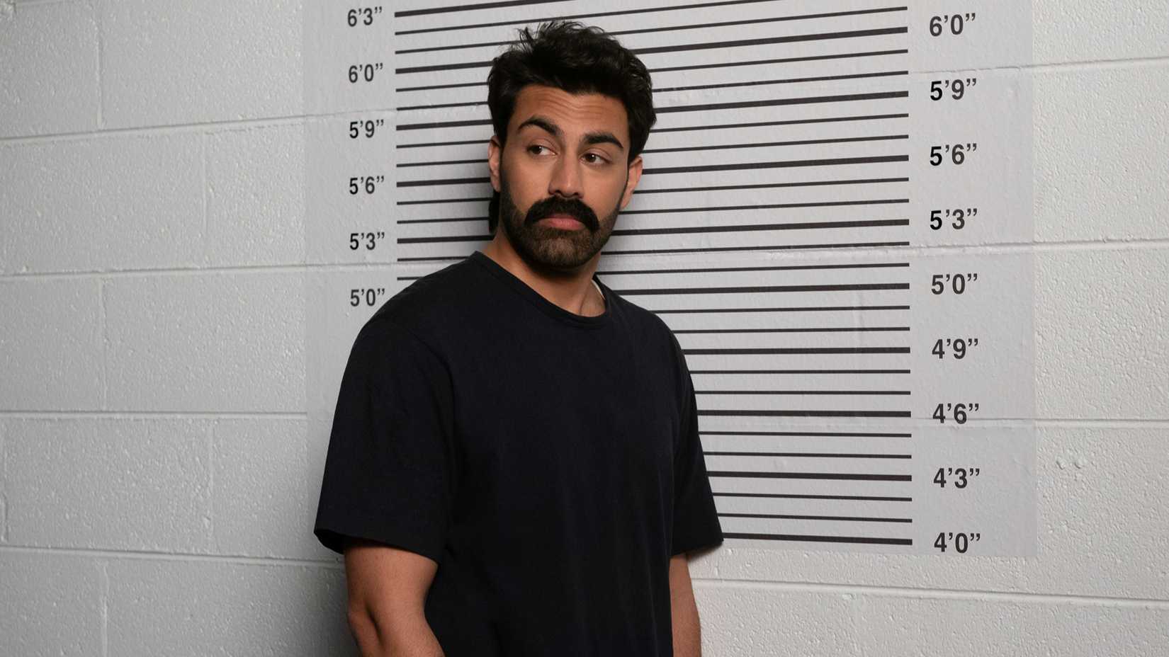 Raj's mugshot in Deli Boys season 2