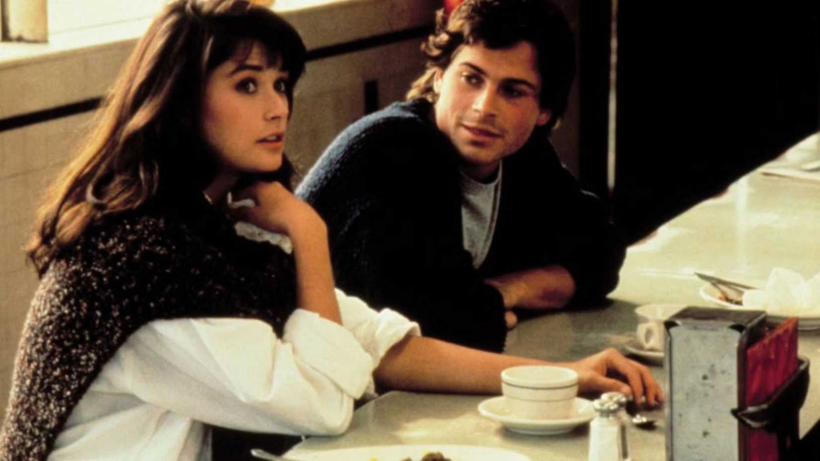 Demi Moore e Rob Lowe em cena de About Last Night