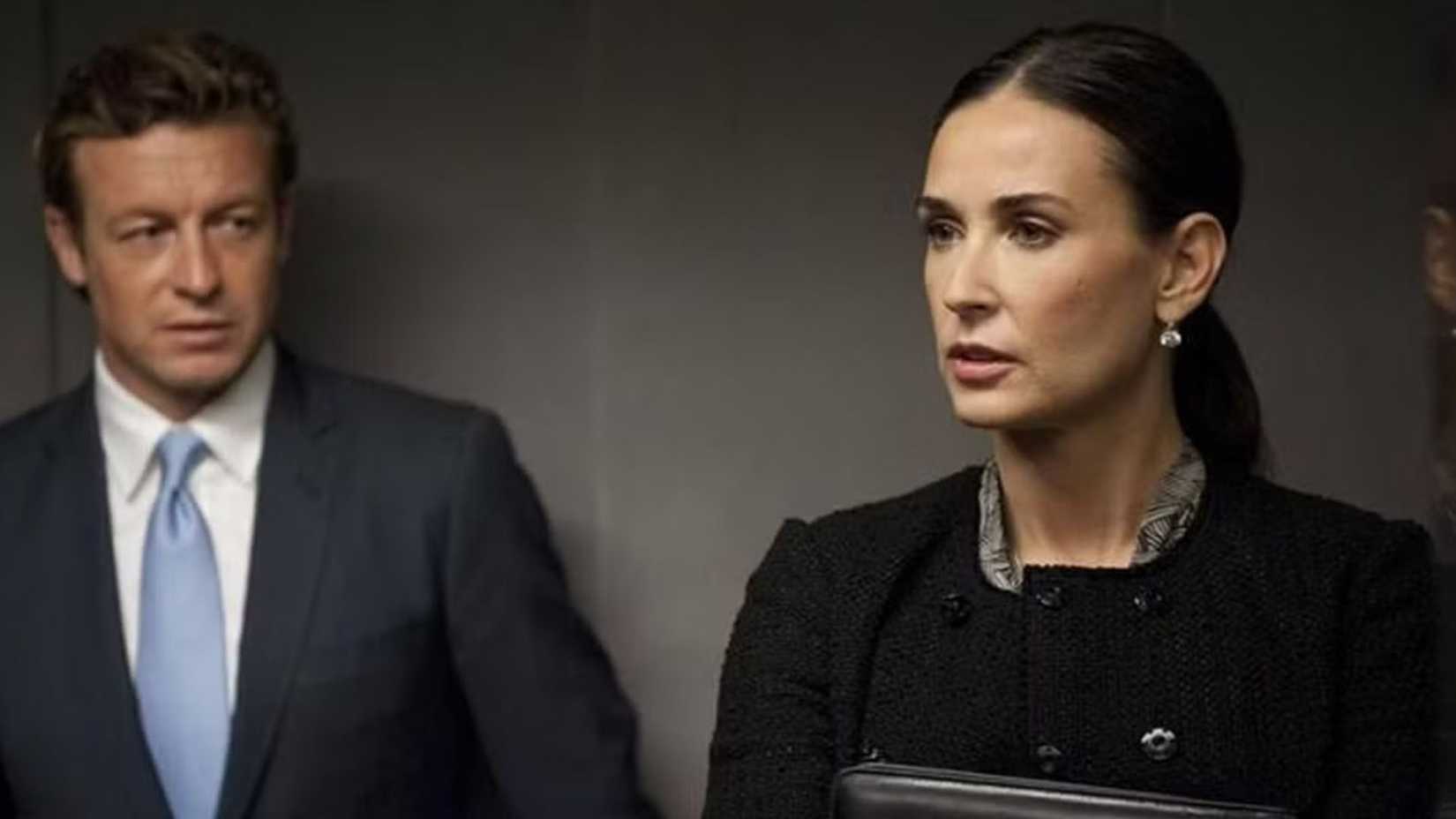 Demi Moore e Simon Baker em Margin Call