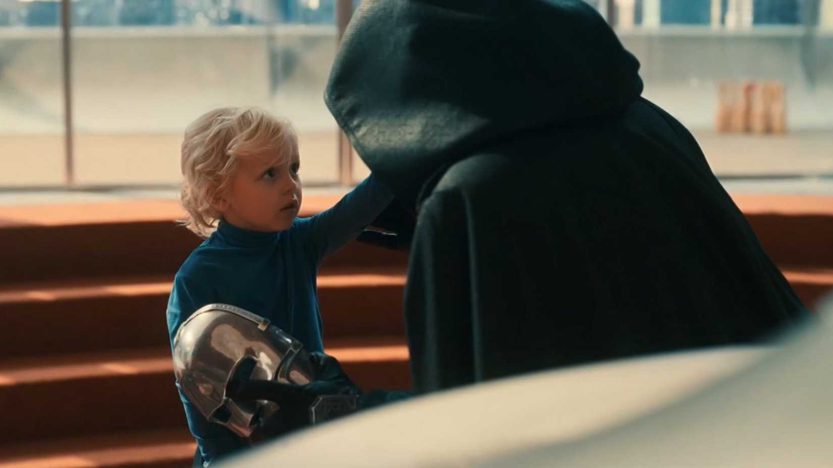 doctor doom kneeling next to franklin in the fantastic four first steps