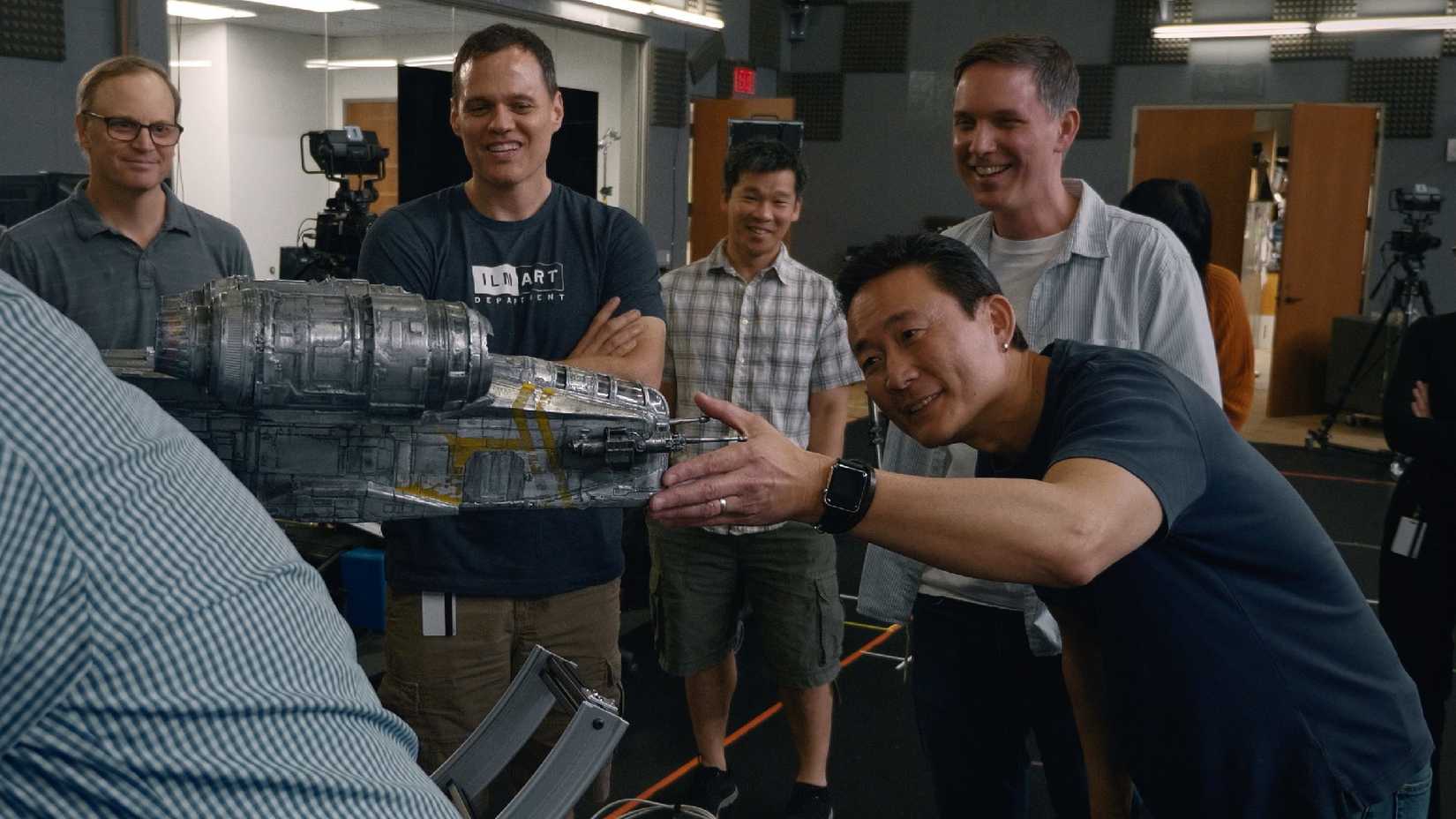 Doug Chiang with the Razor Crest model