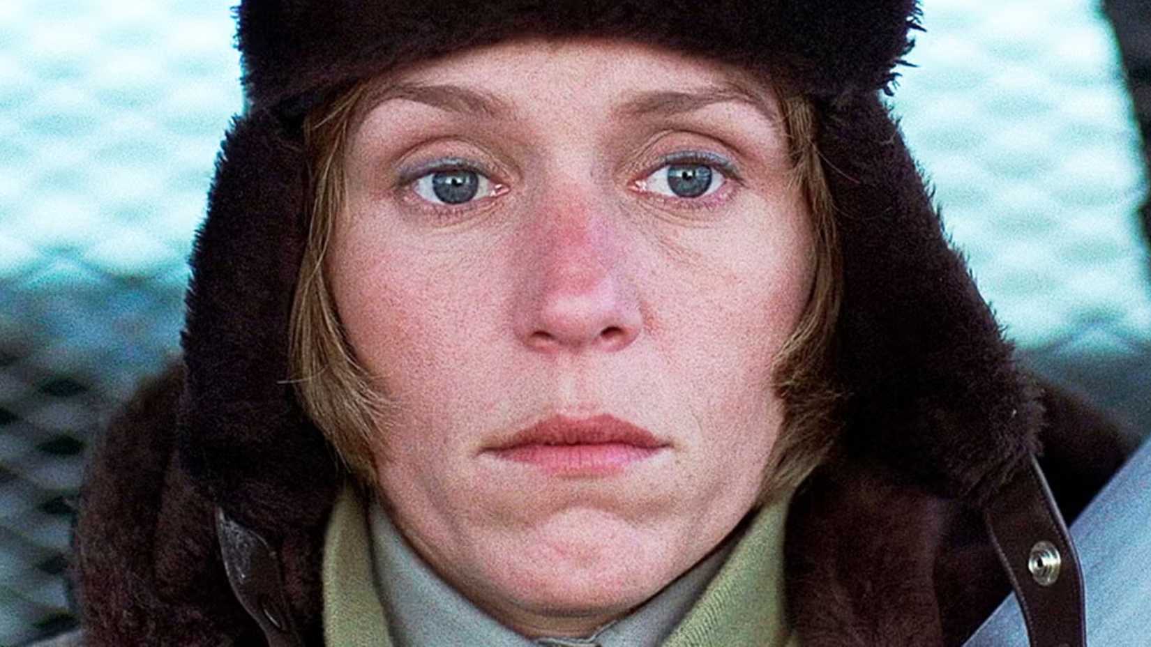 A close-up of Frances McDormand in Fargo. She is wearing a fur police officer's winter hat and her eyes are blank.
