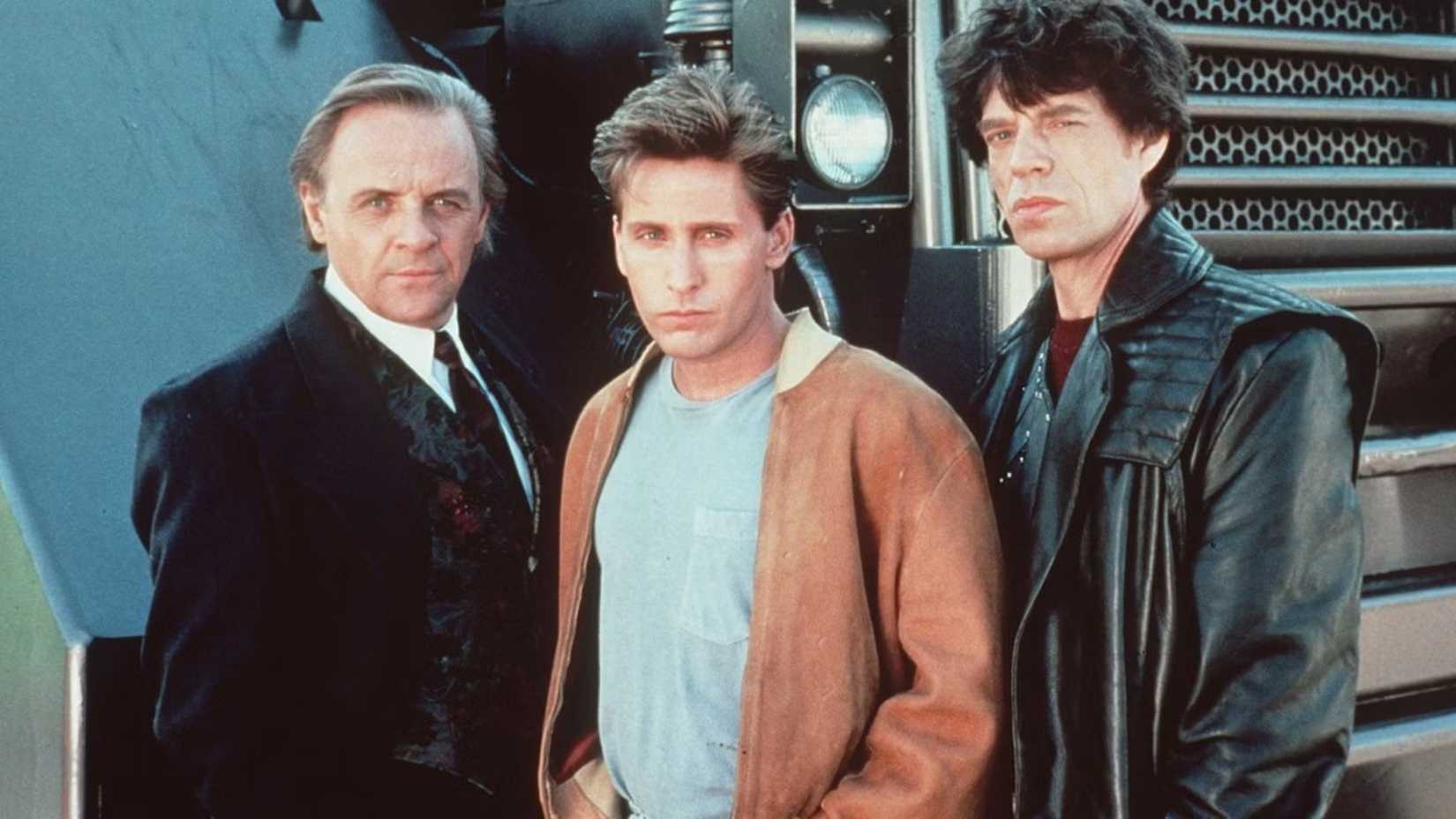 The cast of Freejack pose while looking at the camera