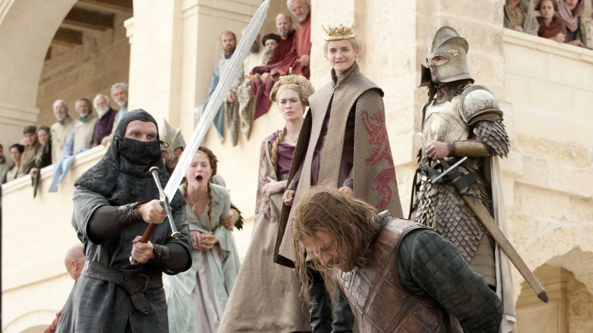 The Lannisters watching Ned Stark (Sean Bean) get beheaded in Game of Thrones.
