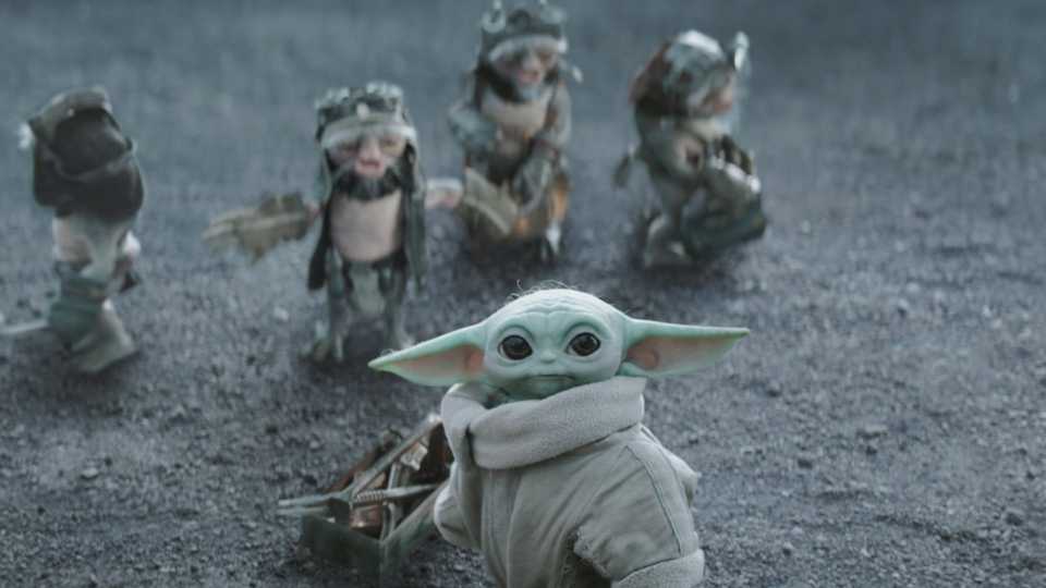 Grogu standing in front of a group of anzellans in The Mandalorian and Grogu