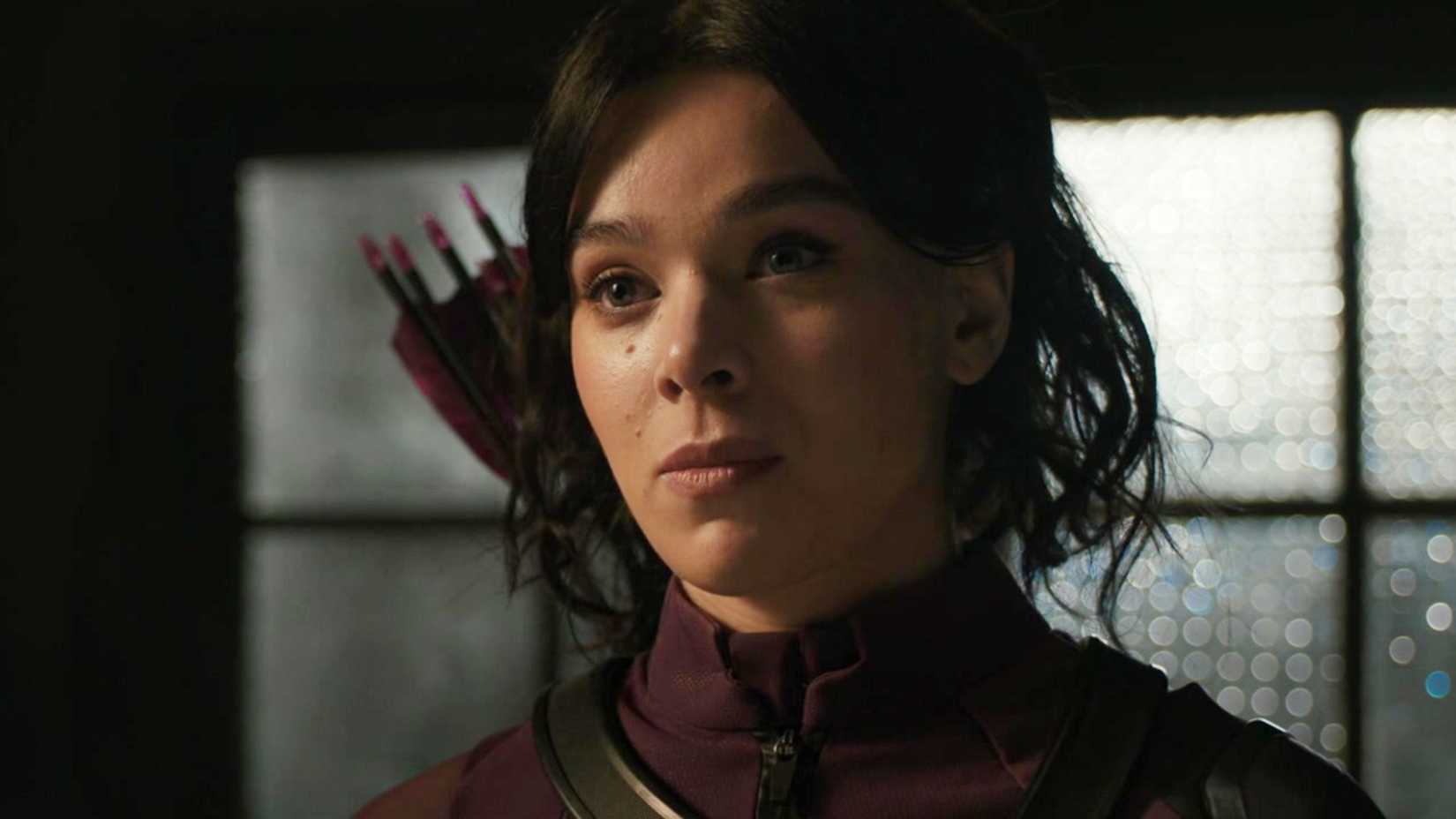 Hailee Steinfeld looking curious as Kate Bishop in The Marvels