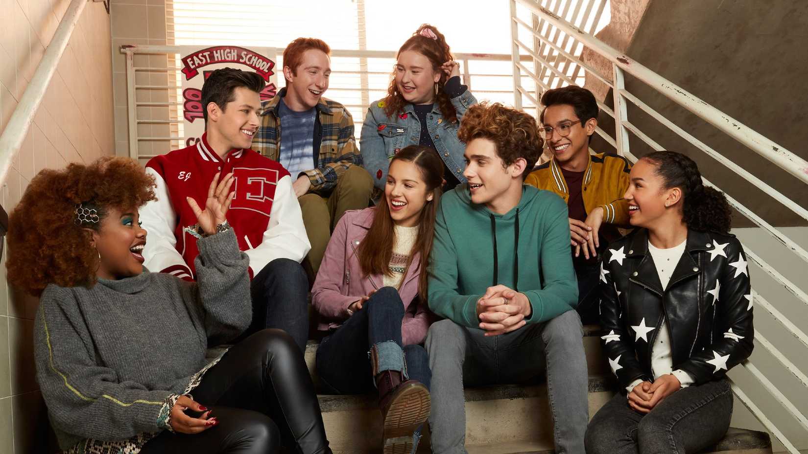 high school musical the musical the series cast sitting on the stairs