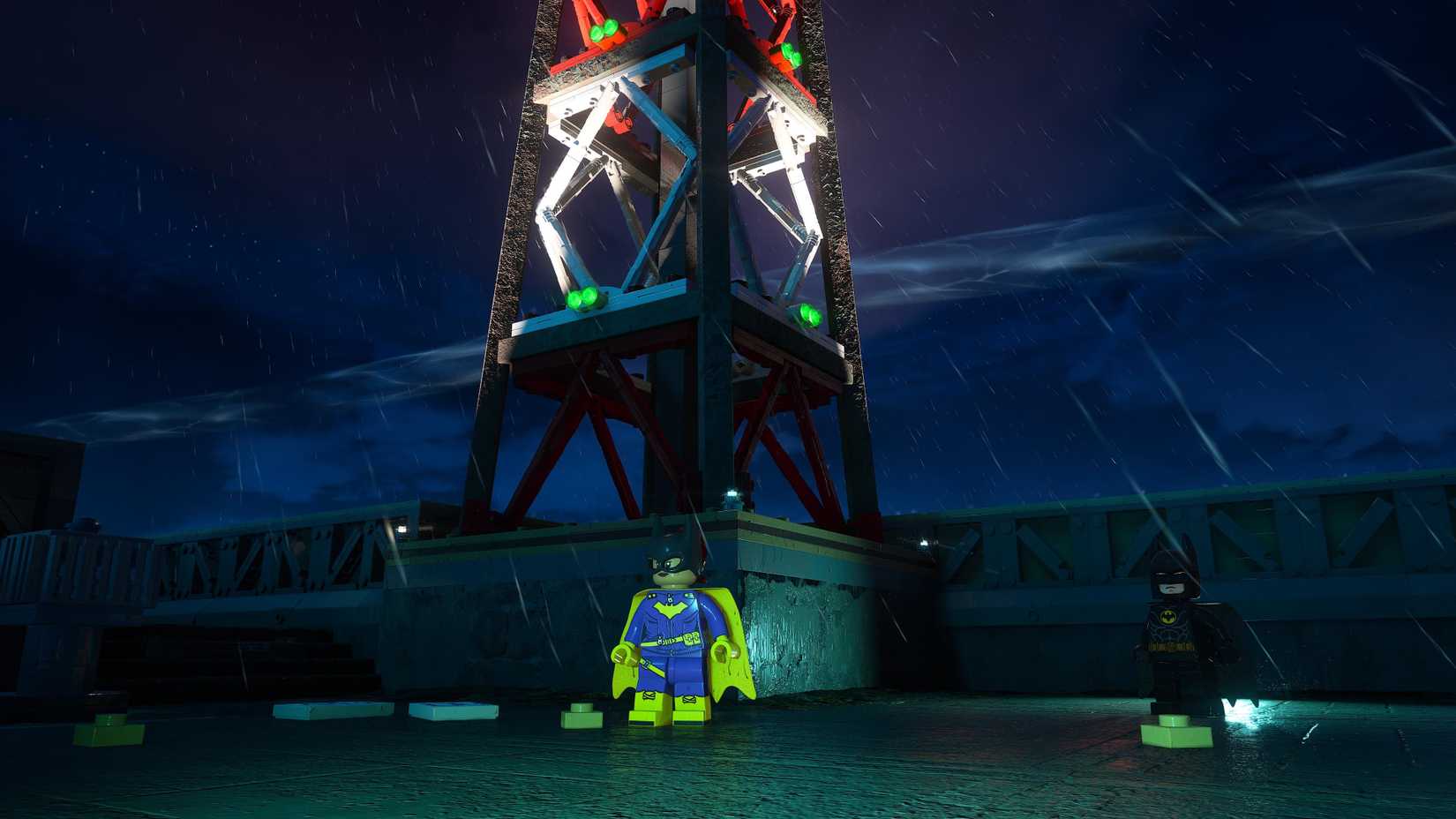 Batgirl in front of a radio tower in LEGO Batman Legacy of the Dark Knight