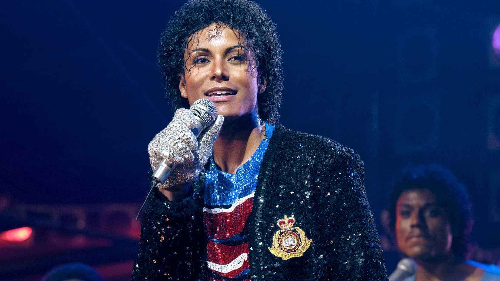 Jaafar Jackson as Michael Jackson performing in a spangled jacket in Michael 2026