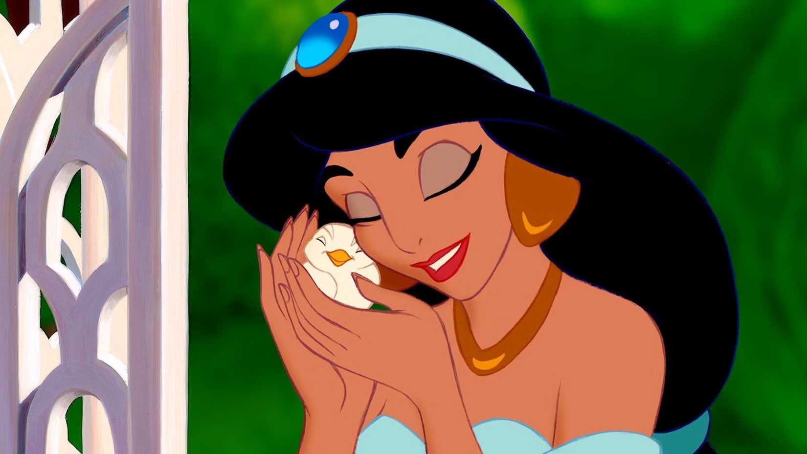 Jasmine snuggling up to a small bird in Disney's Aladdin