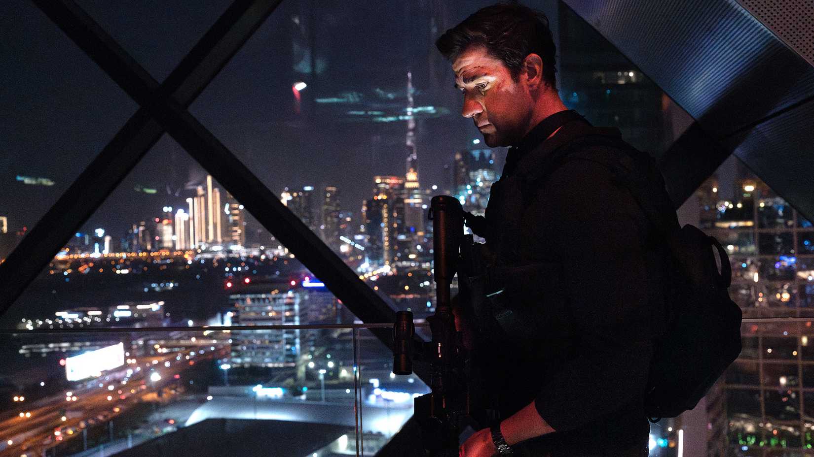 john krasinski against city views in jack ryan ghost war