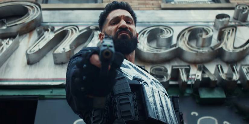 jon bernthal holding a gun in the punisher one last kill