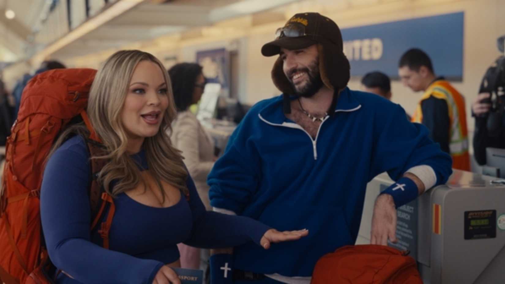 Jordan Firstman smiling at Trisha Paytas in Hacks season 5 Amazing Race episode