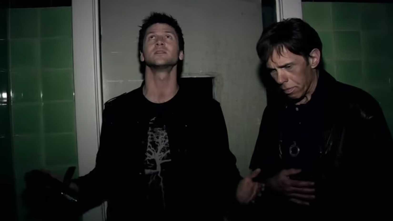 Lance trying to communicate with a ghost in the hospital in Grave Encounters