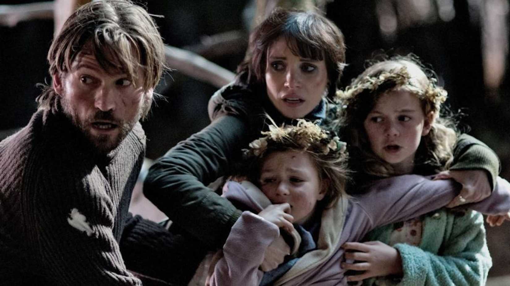 Lucas and Annabelle protecting Victoria and Lily from the ghost in Mama