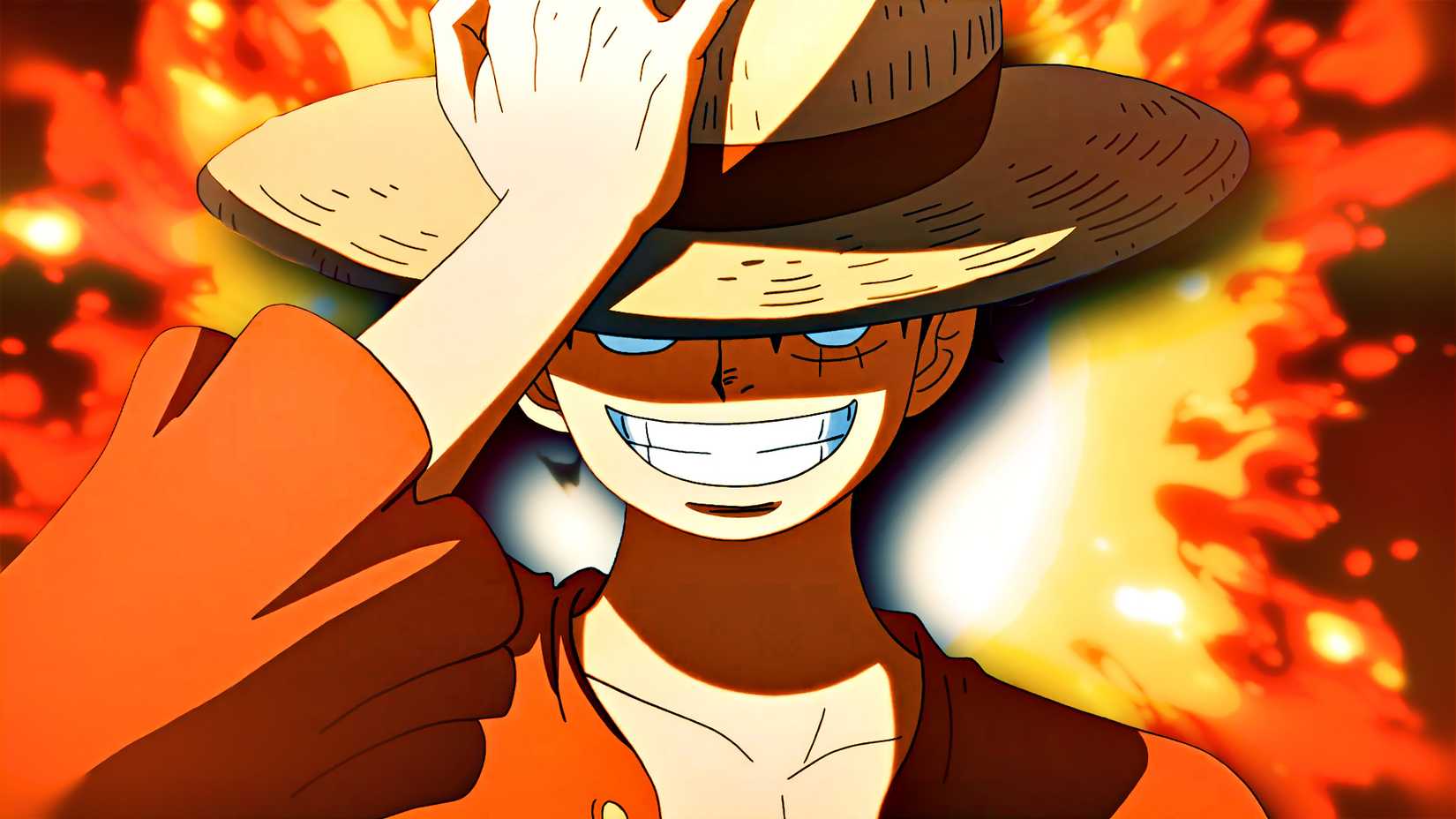 Luffy sourit en baissant son chapeau.