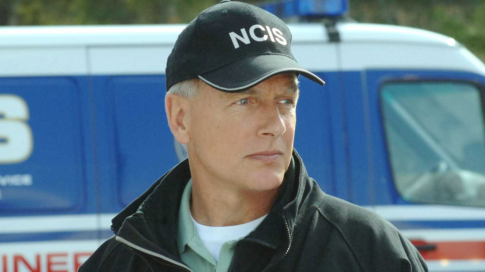 Mark Harmon as Gibbs wearing an NCIS hat in NCIS