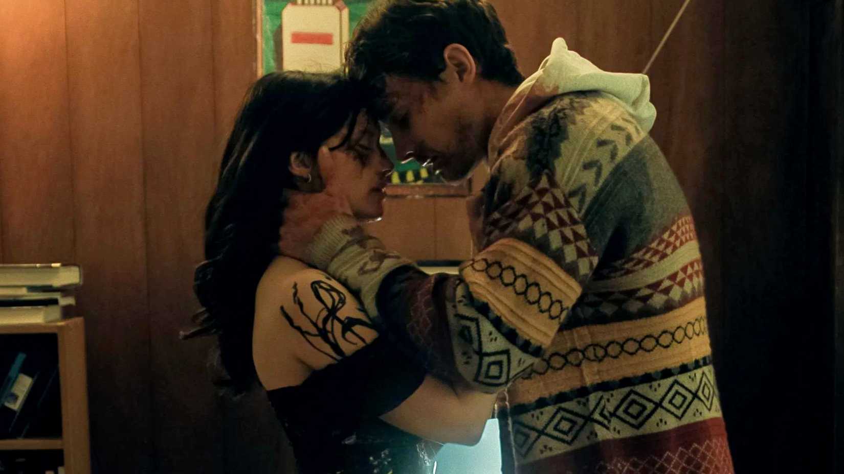 Michael Johnston and Inde Navarrette embracing in Obsession 2026
