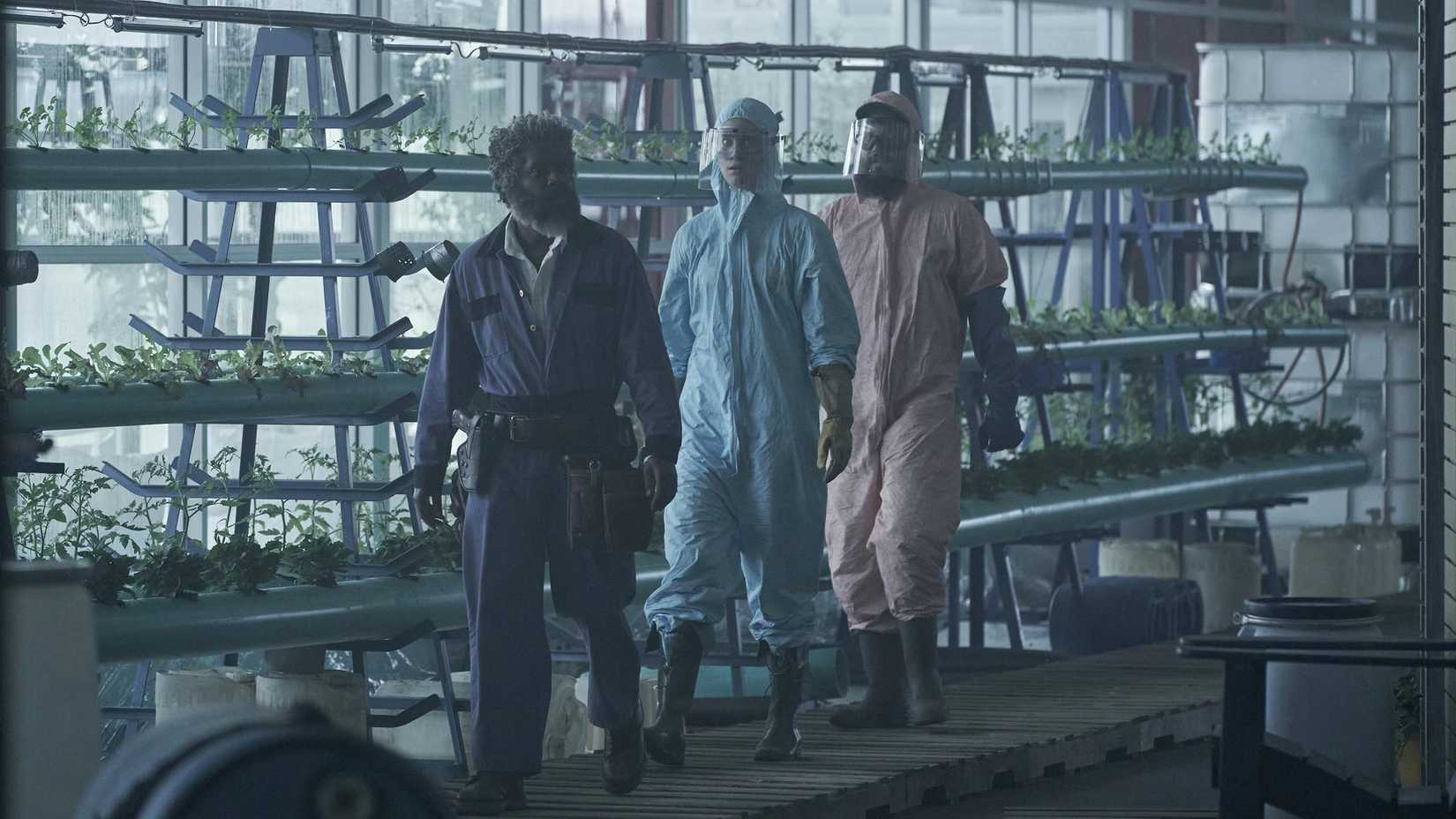 Milton Barnes, Mackenzie Davis, and Daniel Zovatto in Station Eleven