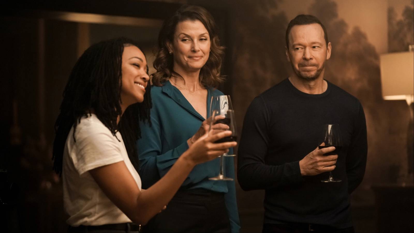 Lena toasting Erin and Danny in Boston Blue season 1