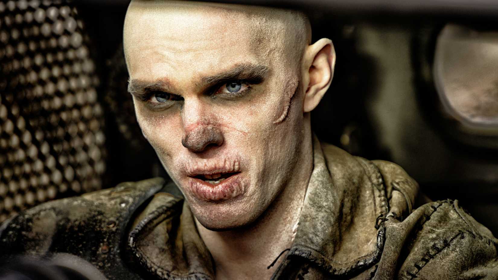 Nux (Nicholas Hoult) driving in Mad Max: Fury Road.