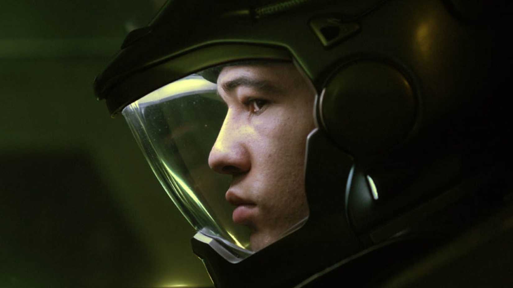 Profile of a man in a space suit in Battlestar Galactica