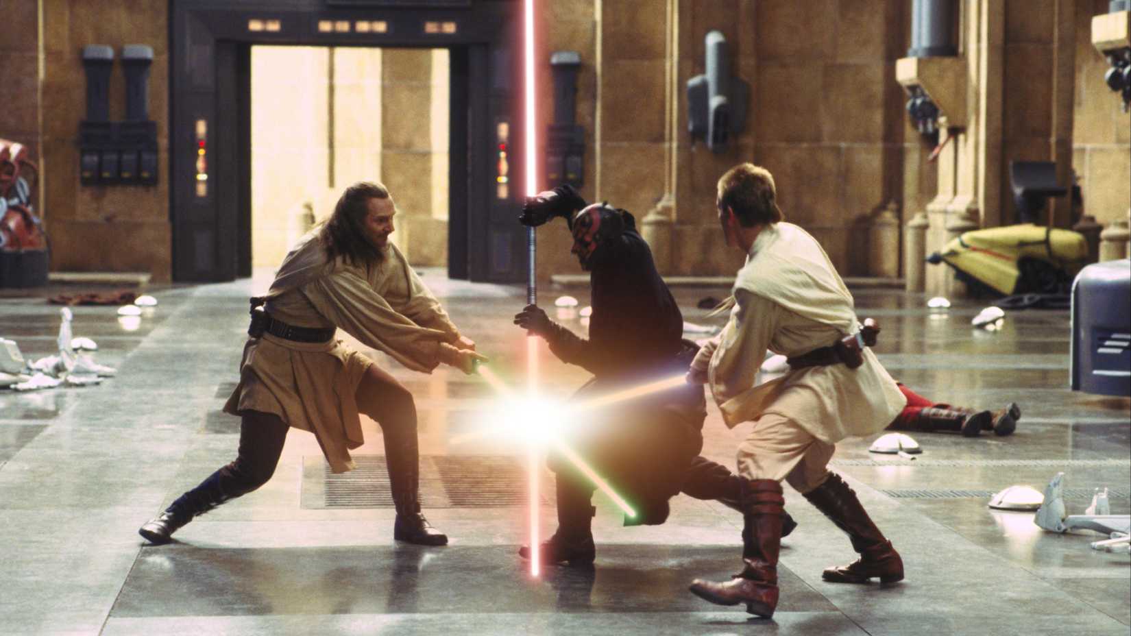 Qui-Gon Jinn (Liam Neeson), Darth Maul (Ray Park), and Obi-Wan Kenobi (Ewan McGregor) dueling in The Phantom Menace