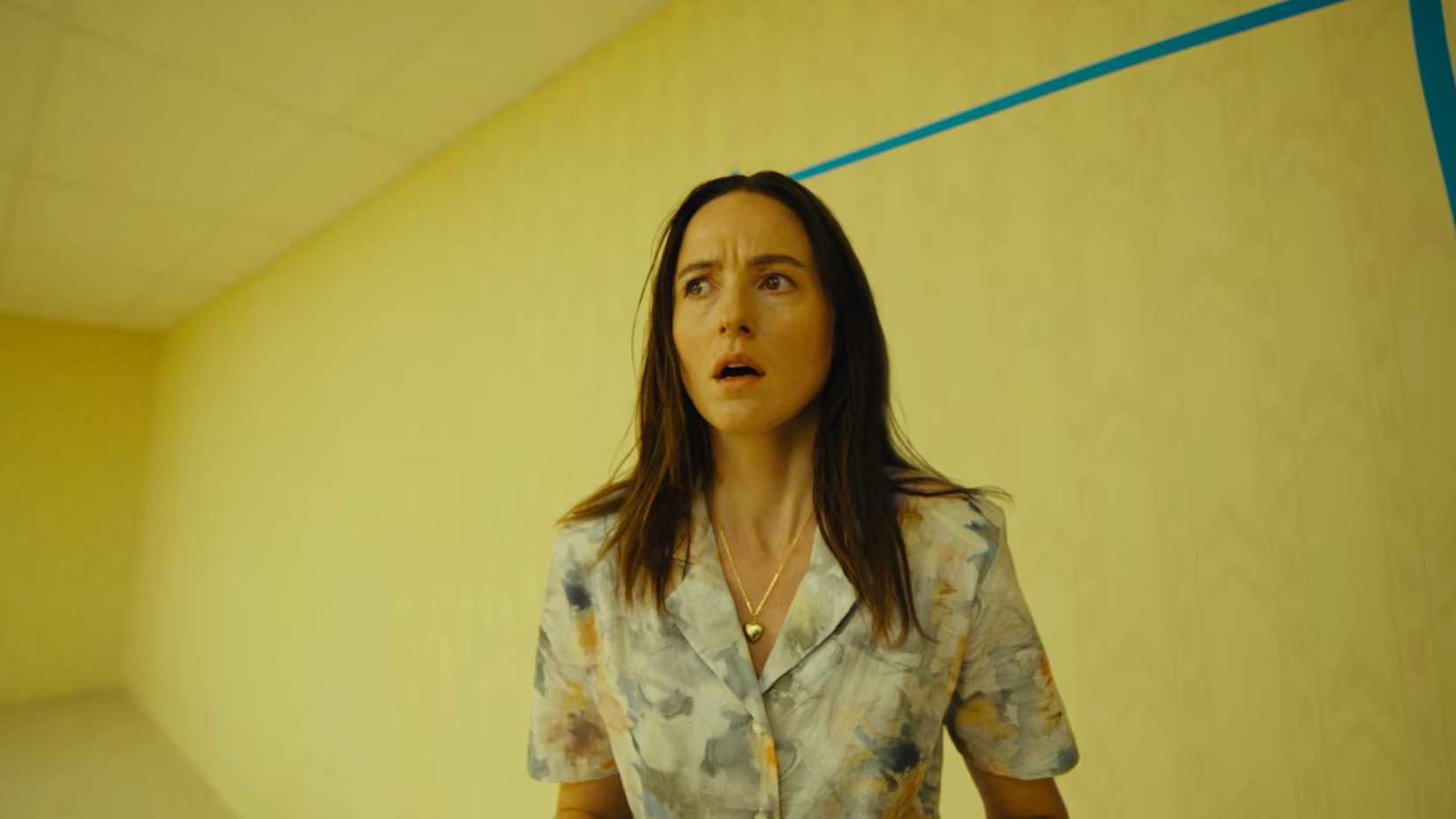 Renate Reinsve as Dr. Mary Kline looking shocked in Backrooms