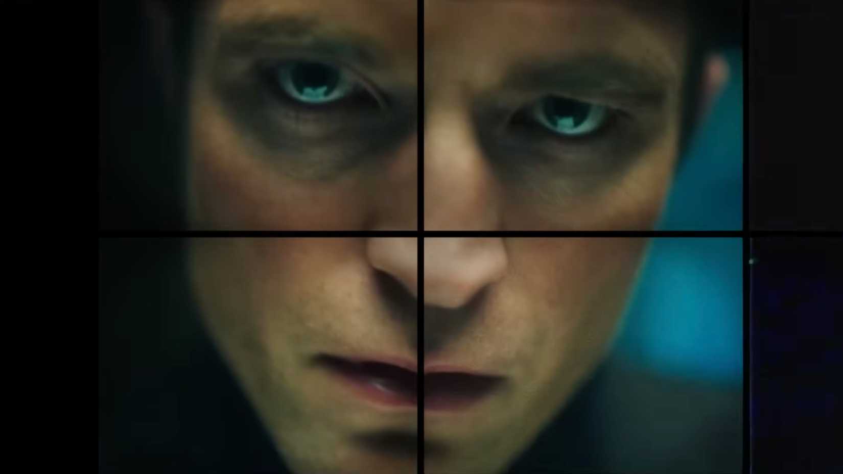 Robert Pattinson as Chris Hansen with his face appearing on four different TVs in Primetime