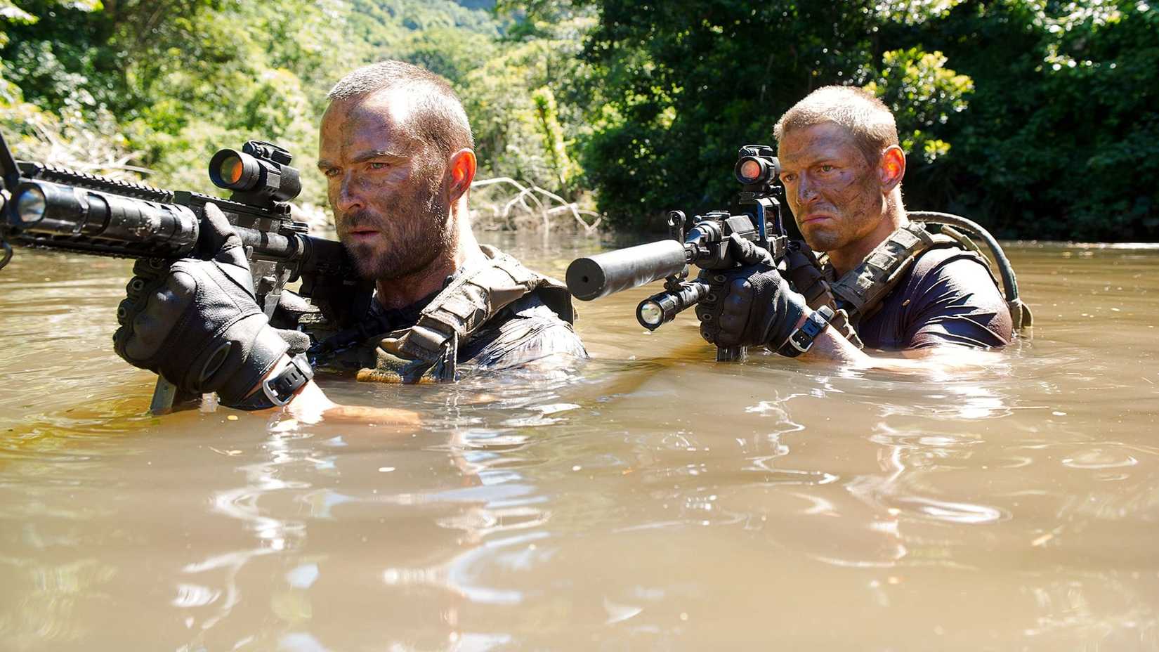 Scott (Sullivan Stapleton) and Stonebridge (Philip Winchester) rising from the water in Strike Back