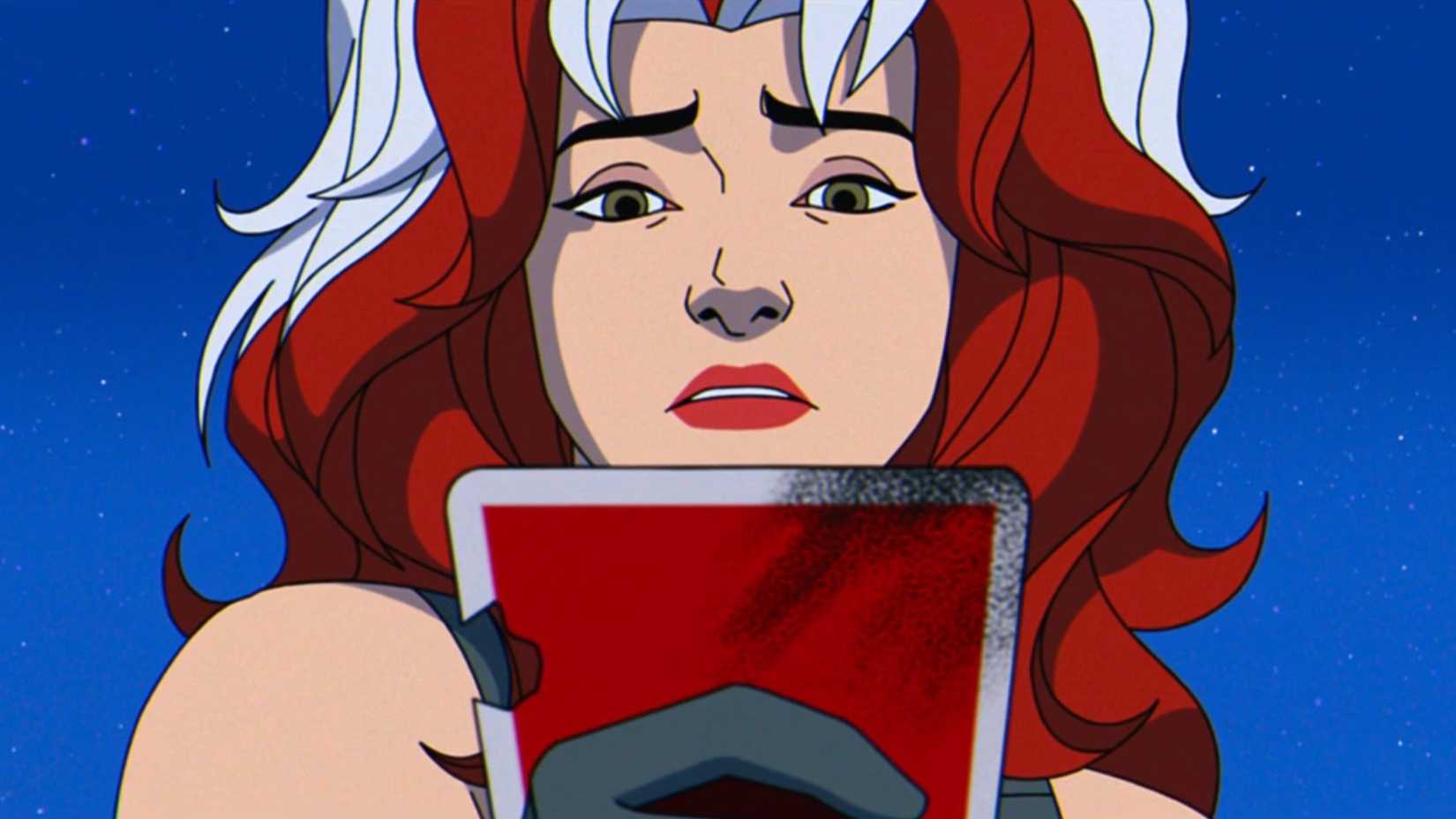 Rogue holding a charred playing card