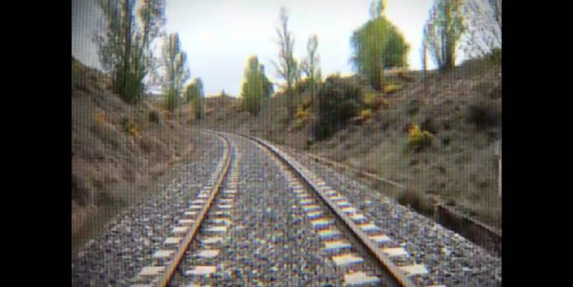 Footage of train tracks from Control, I'm Not Coming Back