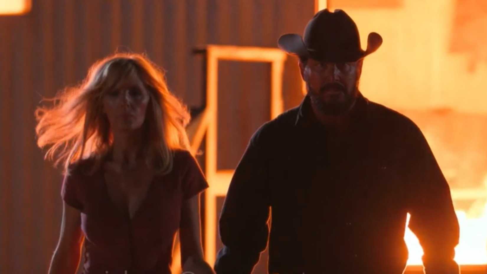 Beth and Rip walk away from fire