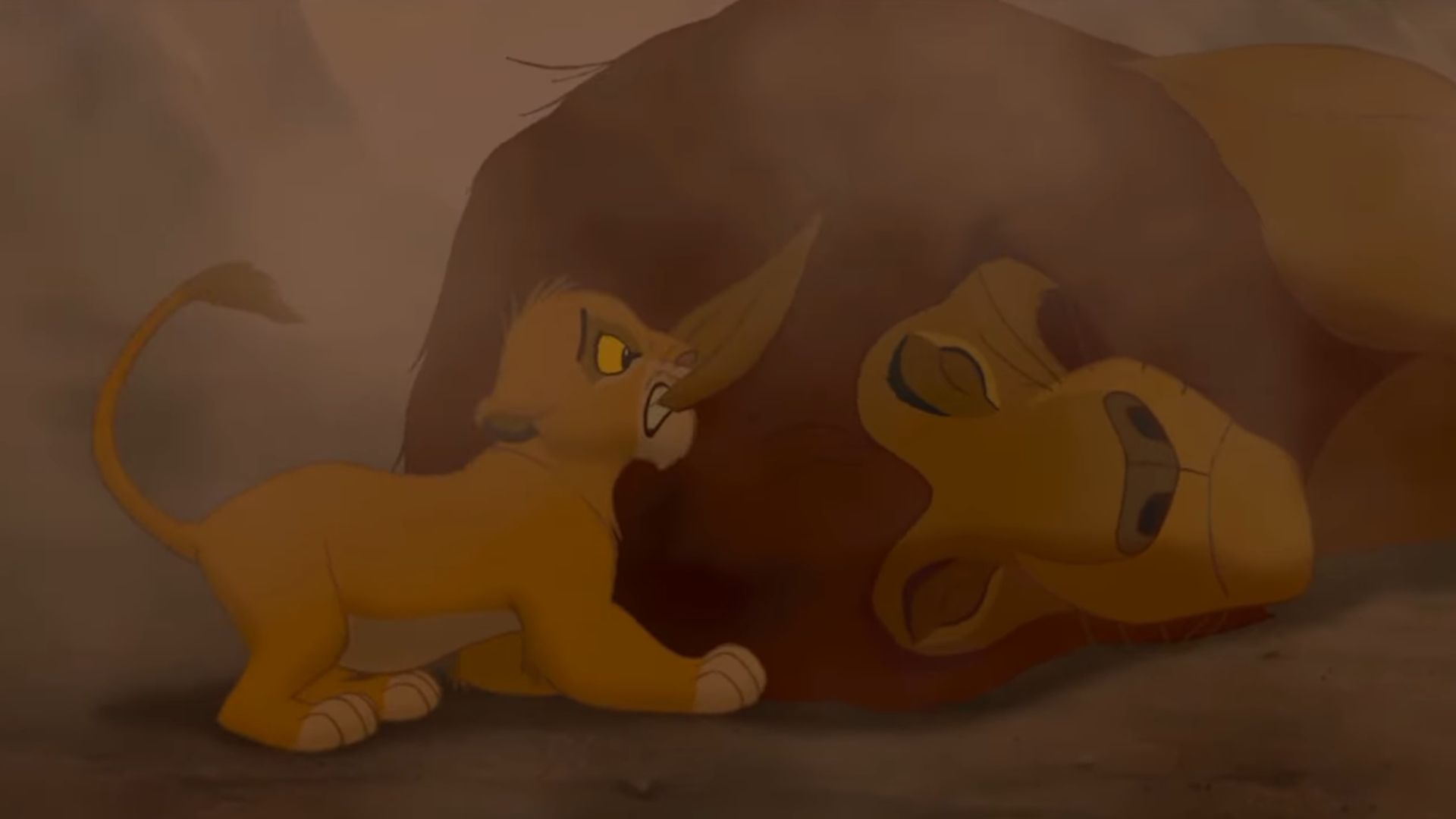 Simba tentando acordar Mufasa após a debandada em O Rei Leão