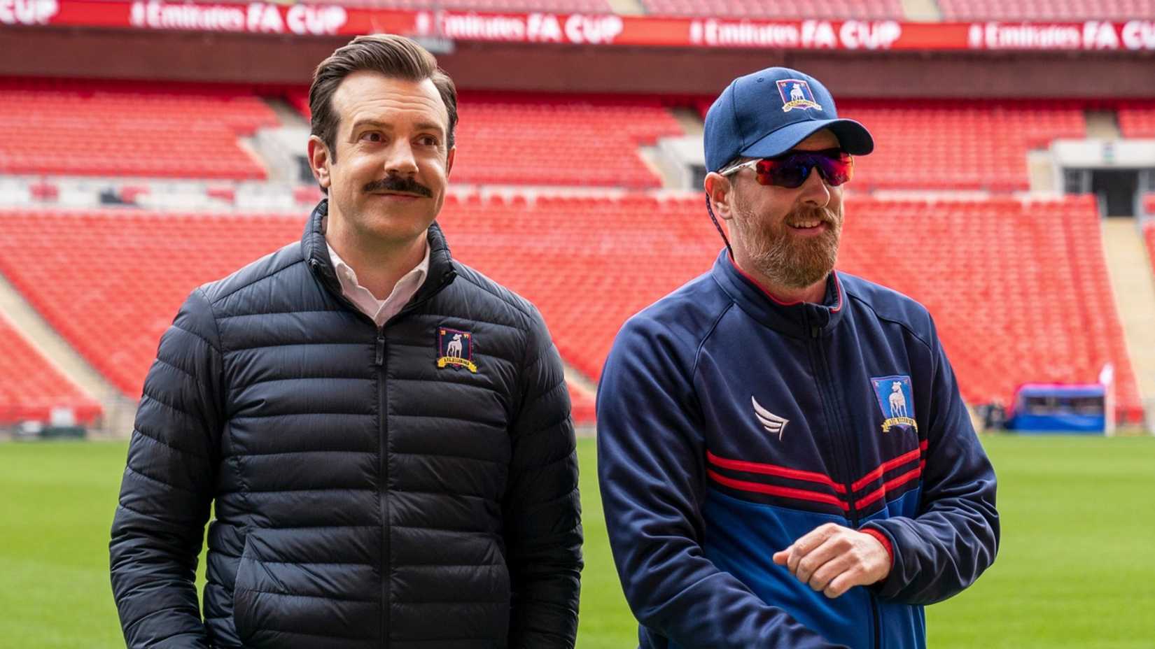 Jason Sudeikis and Brendan Hunt at Wembley Stadium in Ted Lasso