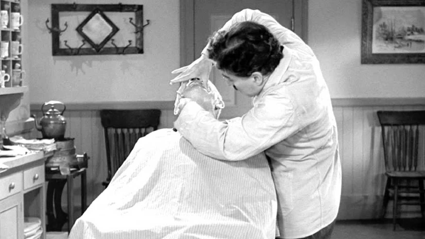 the great dictator scene where charlie chaplin shaves a man to music