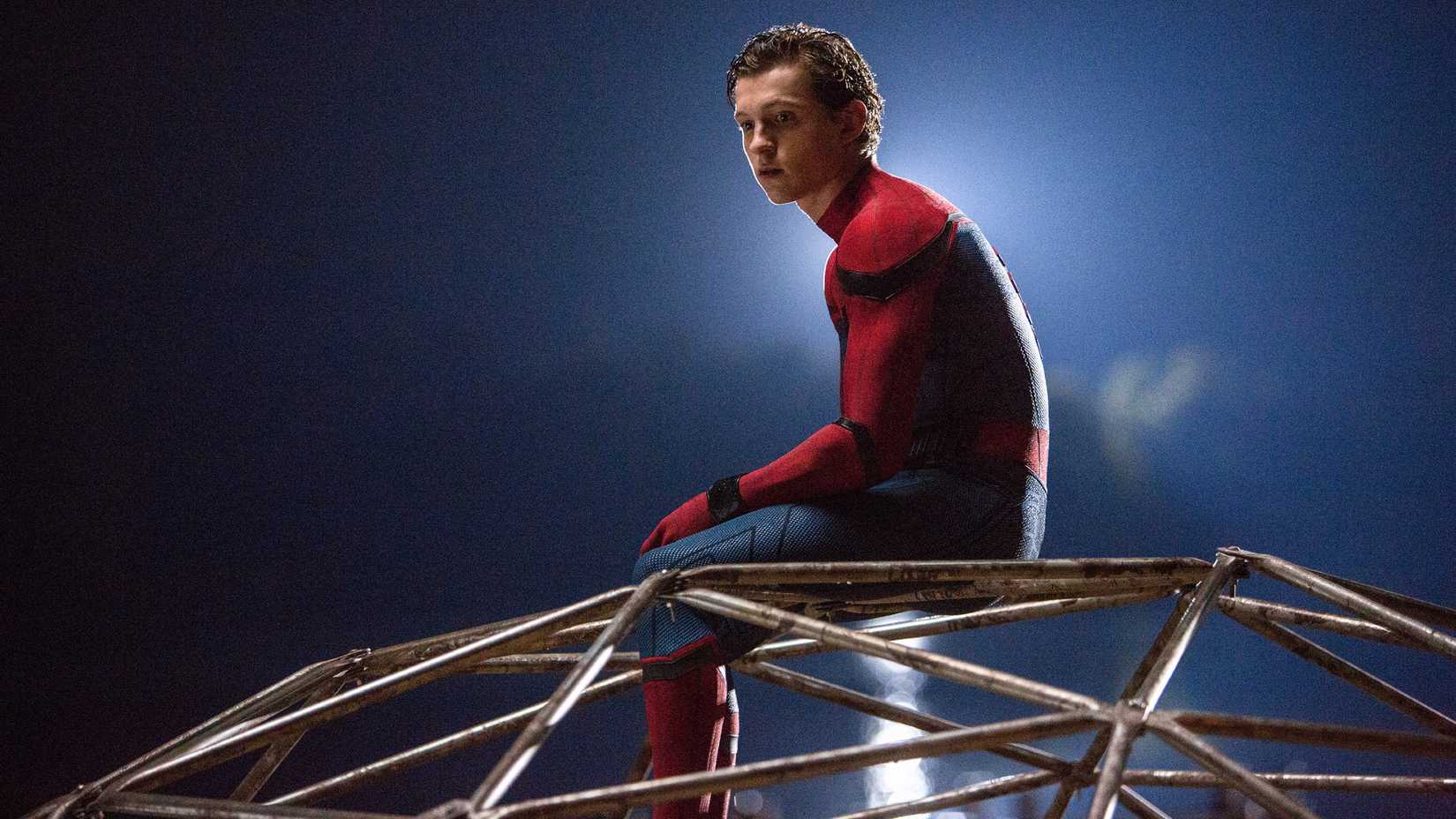 Tom Holland as Peter Parker in Spider-Man Homecoming looking off-screen