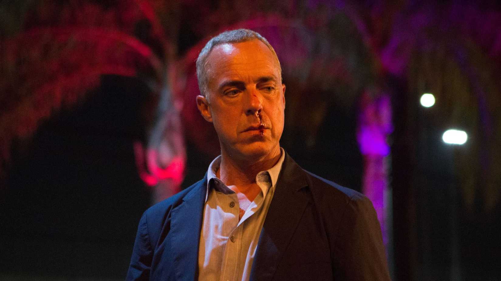 Bosch with a bleeding nose, looking thoughtful