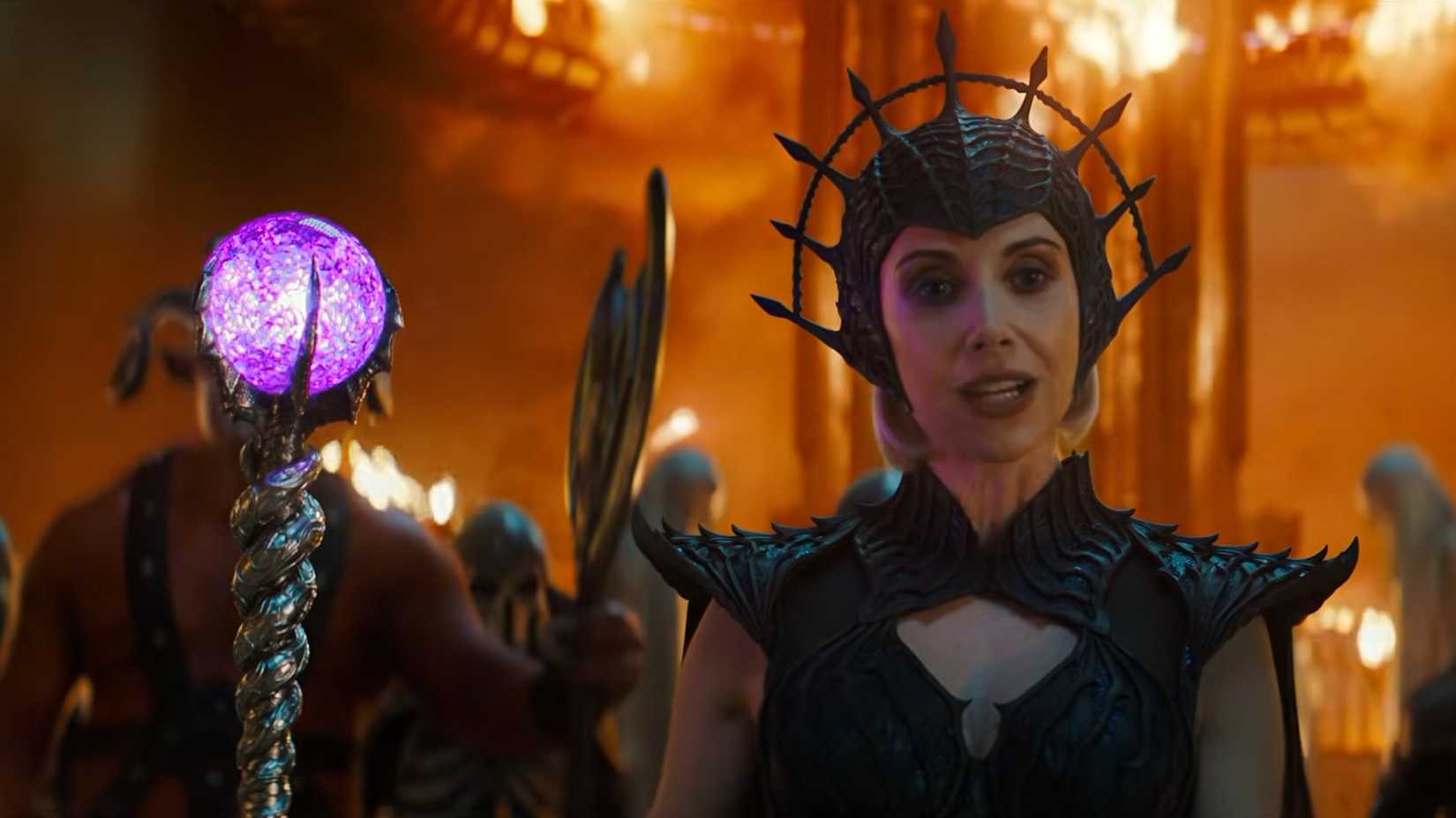 Alison Brie as Evil-Lyn with her staff in Masters of the Universe