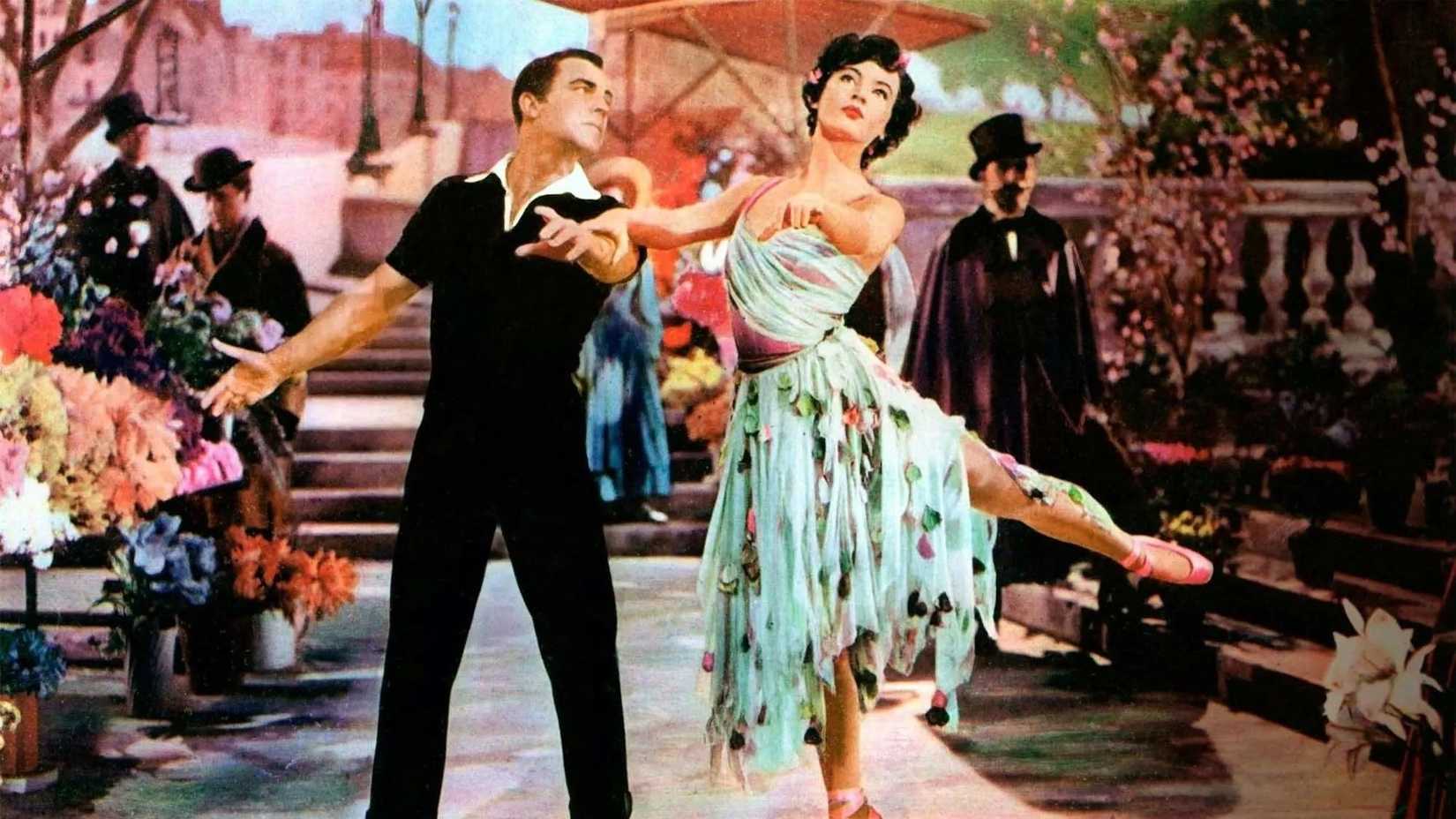 Two people dance in a market in An American in Paris
