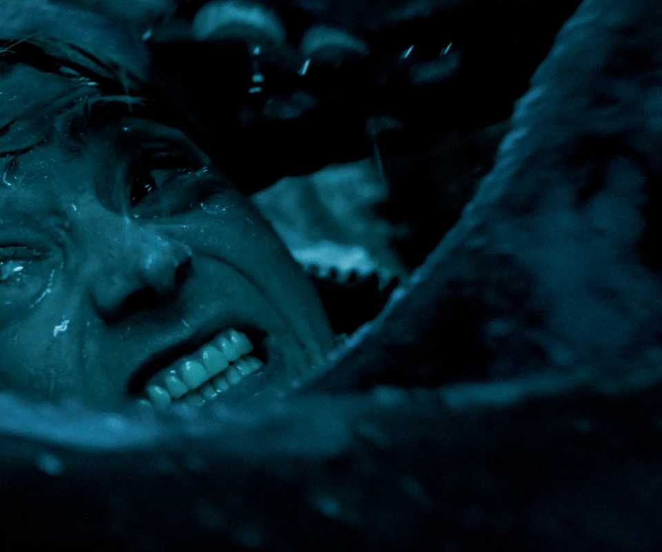 Austin Abrams with squid tentacles around his face in Whalefall