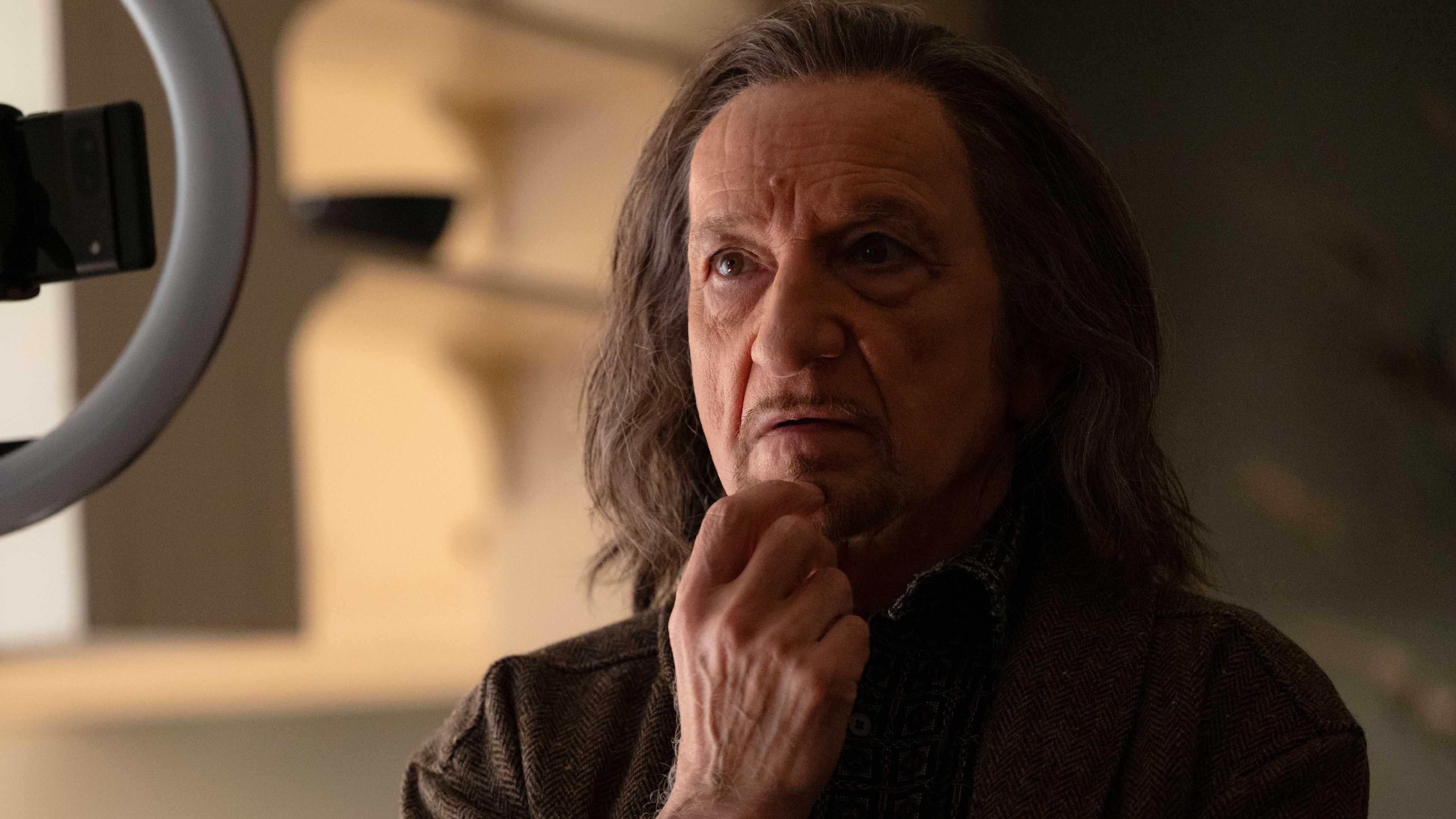 Ben Kingsley puts his hand on his chin while thinking in Wonder Man