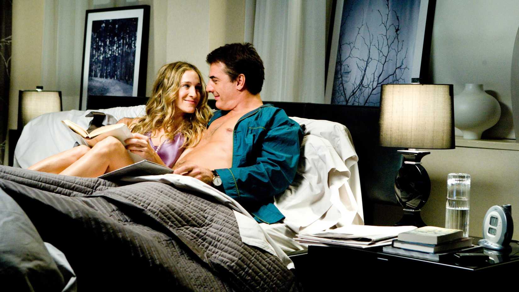 Carrie (Sarah Jessica Parker) and Big (Chris Noth) in bed together in Sex and the City movie