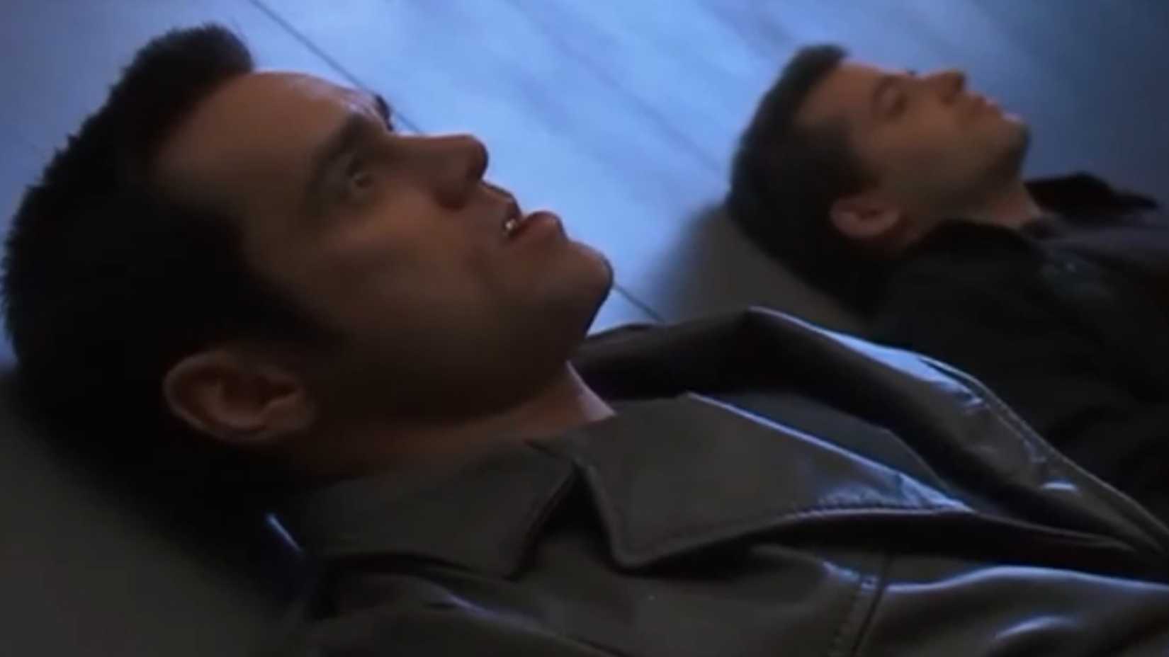 Chip laying next to Steven in a satellite dish in The Cable Guy