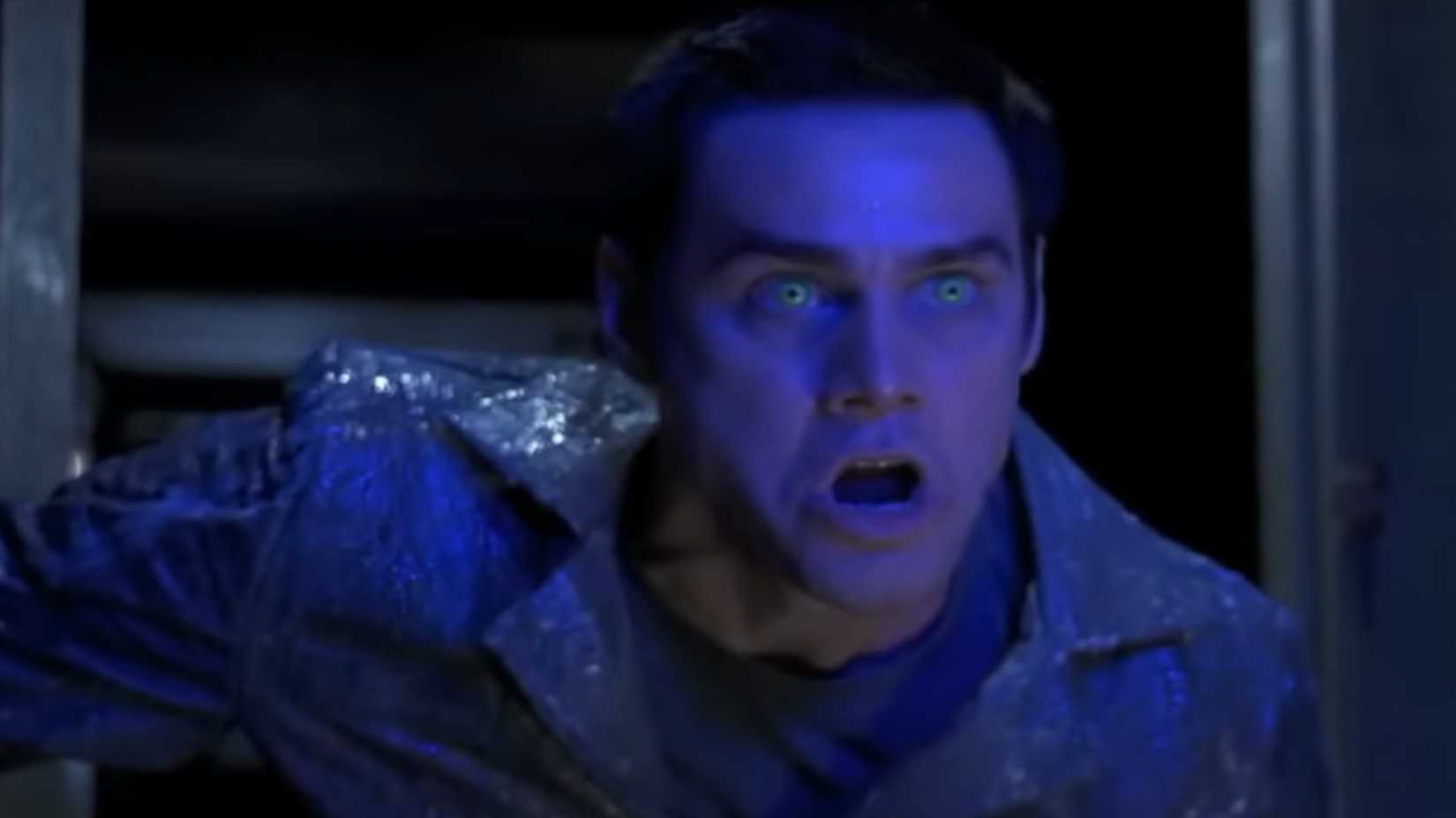 Chip with glowing green eyes in The Cable Guy
