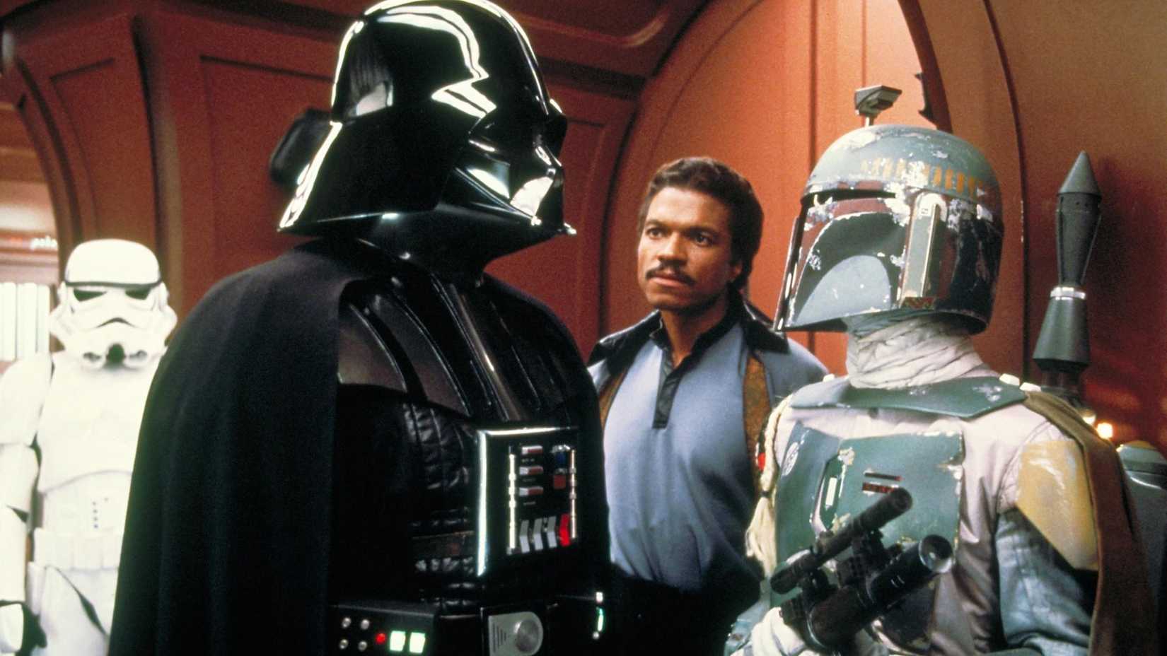 David Prowse as Darth Vader talking to Jerermy Bulloch as Boba Fett in The Empire Strikes Back