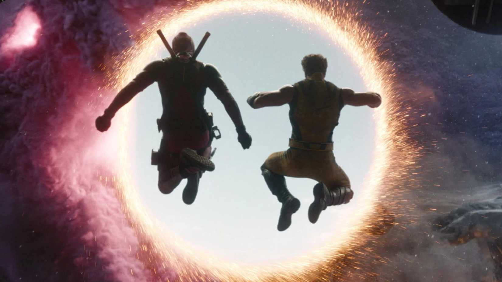 Deadpool and Wolverine jumping into a Doctor Strange portal