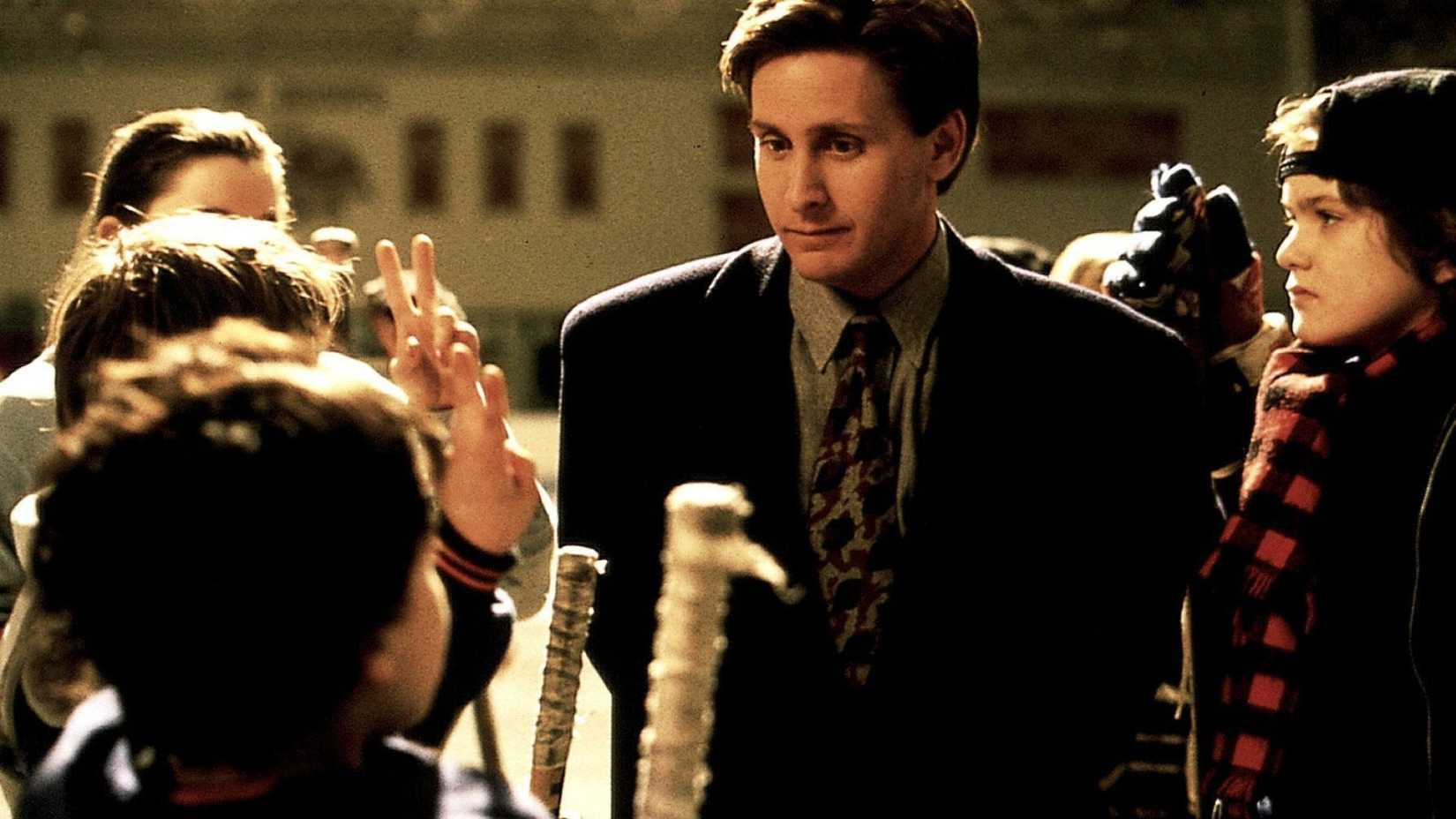 Emilio Estevez as Gordon with his team in The Mighty Ducks